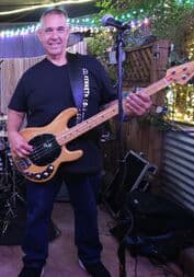 Keith playing bass with Rock Steady