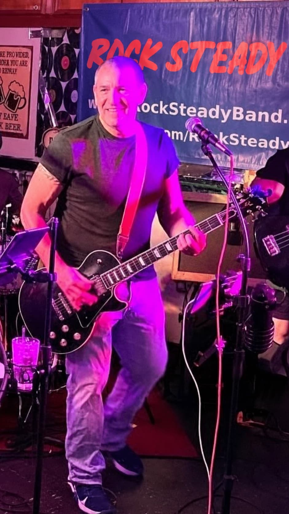 Mike Ross playing guitar with Rock Steady onstage